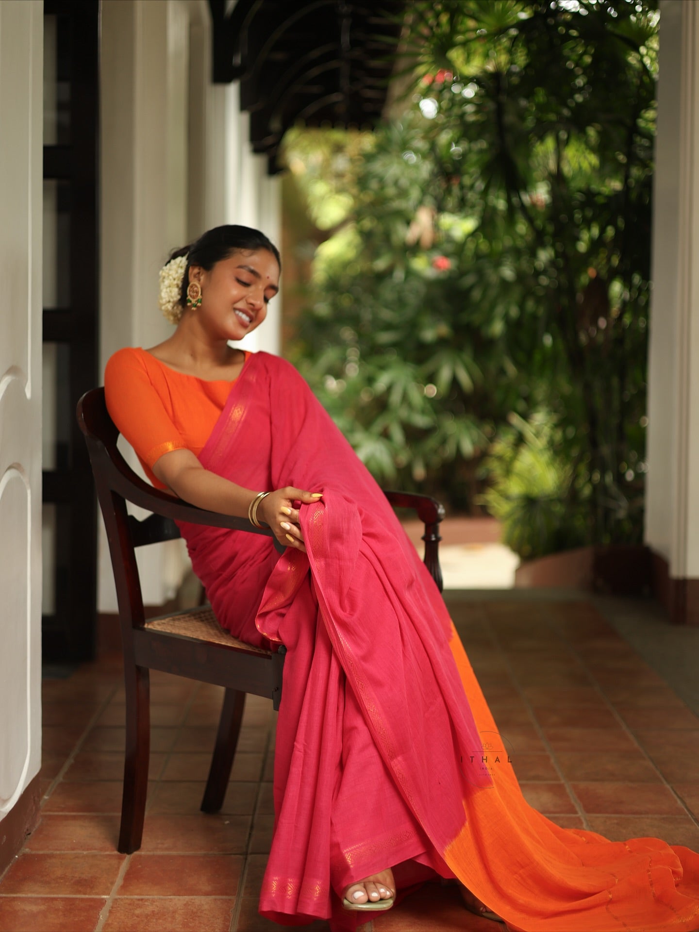 Pink & Orange Sungudi with graceful zari borders