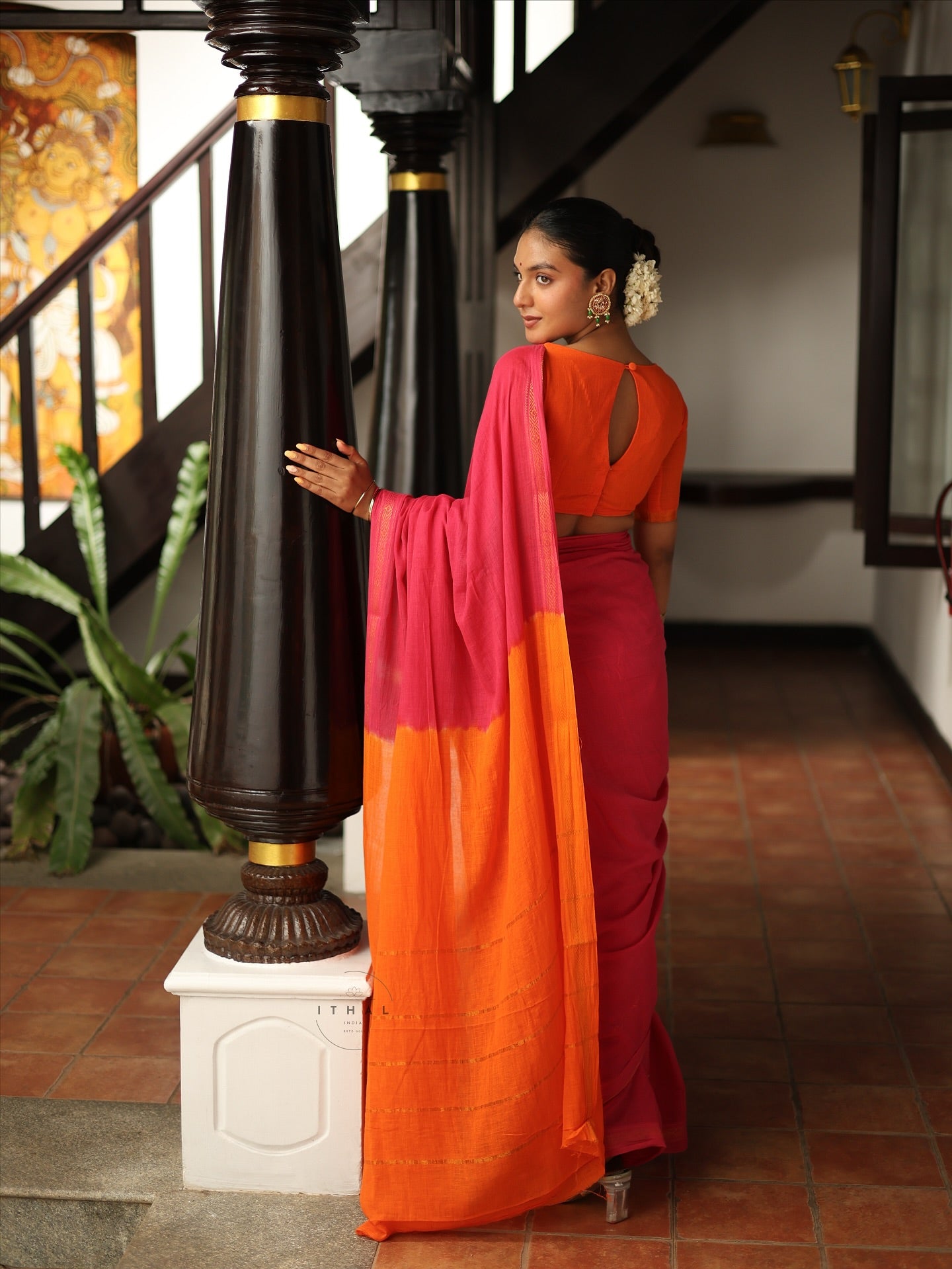 Pink & Orange Sungudi with graceful zari borders
